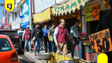 Diez infracciones y clausura por invadir banqueta en Tulancingo