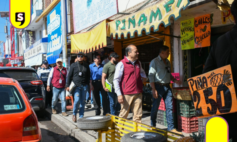 Diez infracciones y clausura por invadir banqueta en Tulancingo