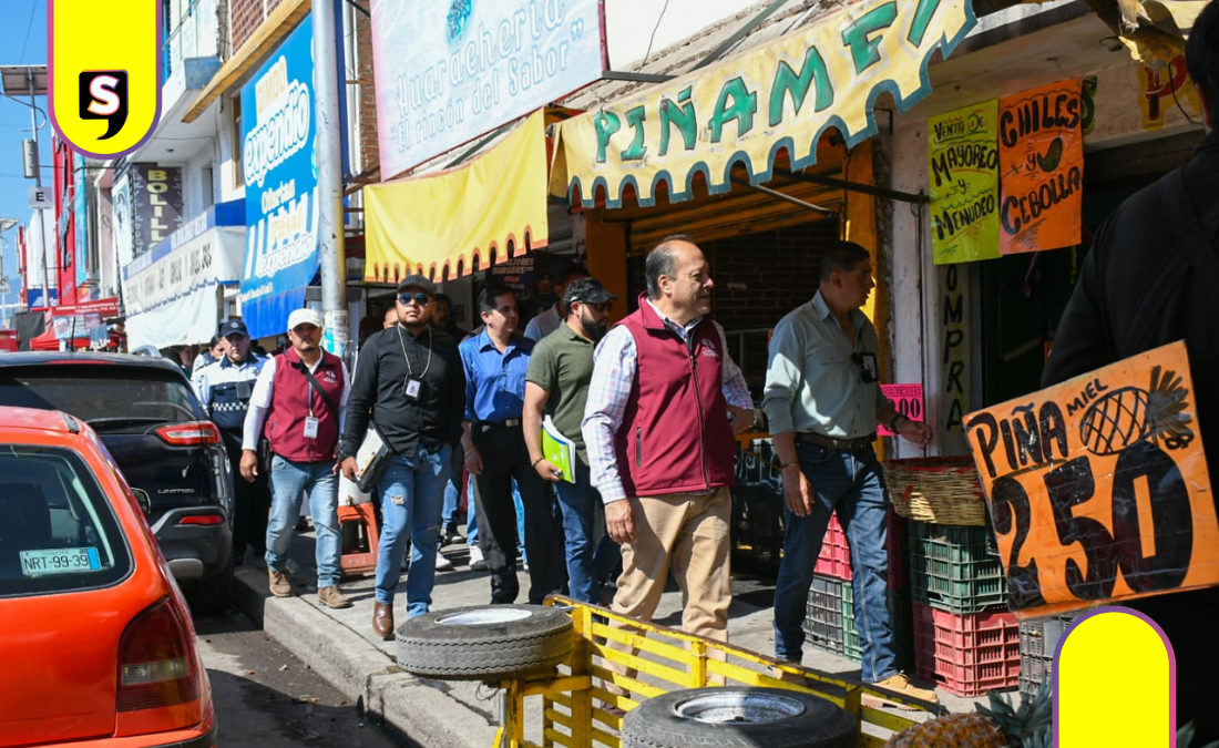 Diez infracciones y clausura por invadir banqueta en Tulancingo